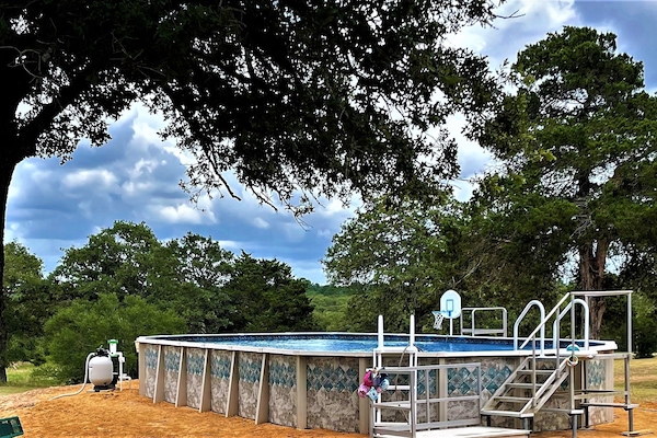Our Pool, still need to complete the landscape. But its ready for swimmers!!